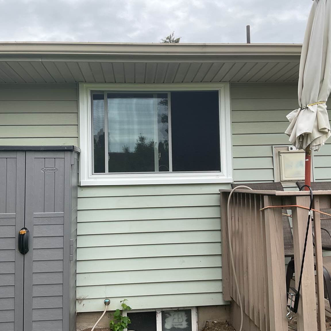 New York Sash's expert installation of sleek sliding windows on the exterior of a Syracuse, NY, residence, enhancing its curb appeal and overall comfort of the homeowner.