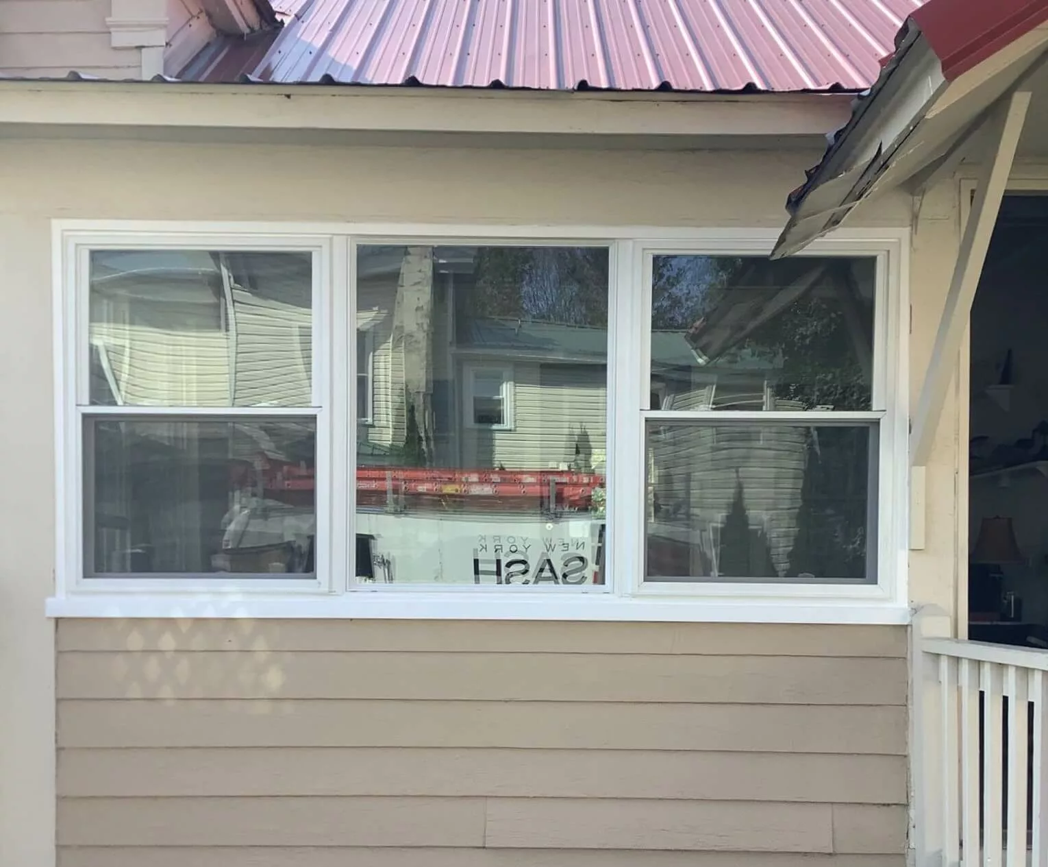 New double hung picture window finished in white